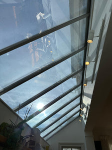Solar tint installed on Velux windows to reduce heat and glare in your kitchen or living room